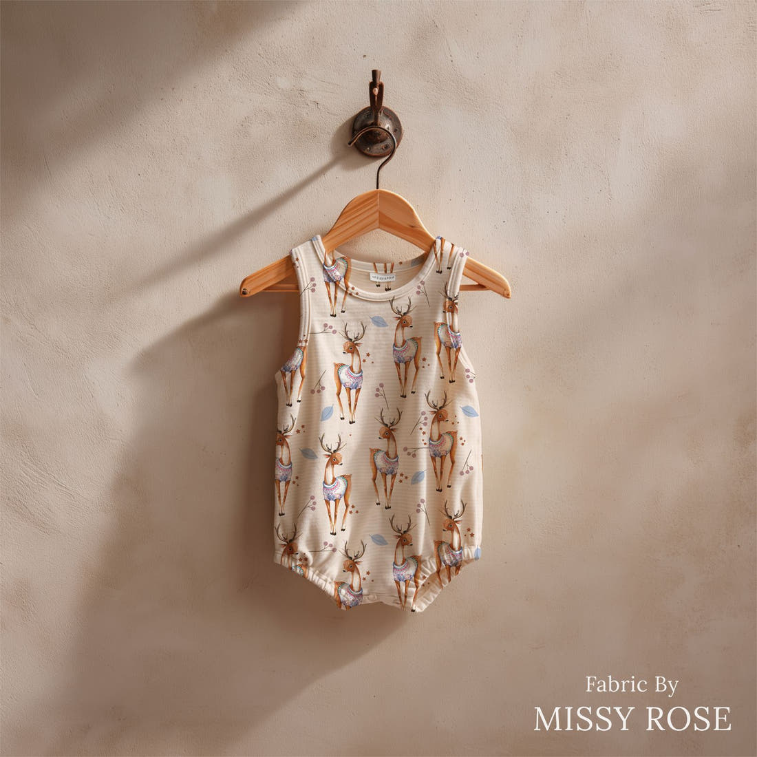 Design 198 Deer Fabric sewn into a baby romper – see how the print looks made up | Fabric by Missy Rose