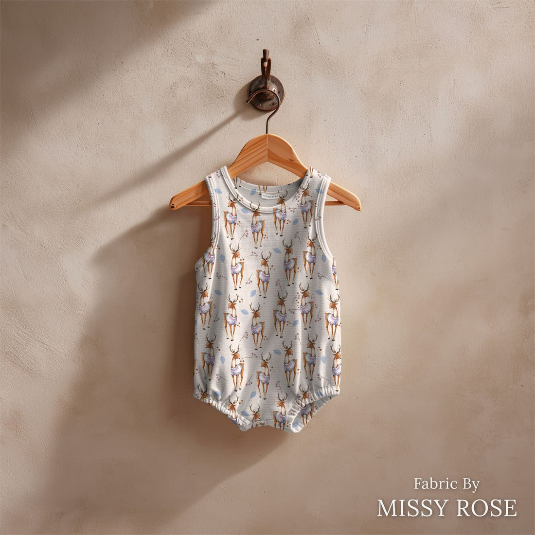 Design 198 Deer Fabric sewn into a baby romper – see how the print looks made up | Fabric by Missy Rose