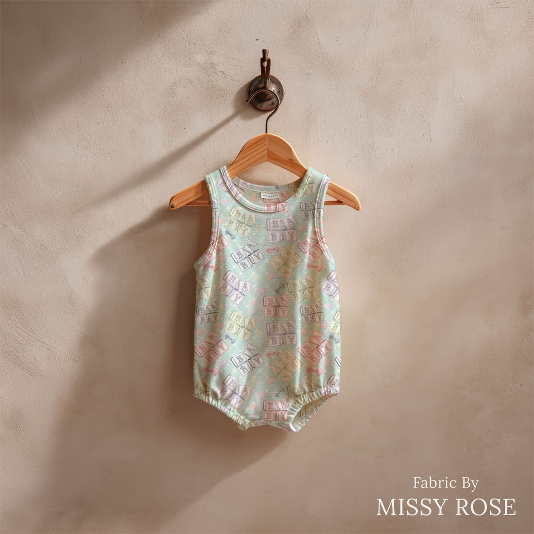 Design 20 Oh Baby Fabric sewn into a baby romper - see how the print looks made up | Fabric by Missy Rose