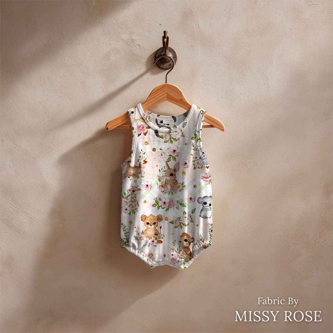 Design 204 Baby Safari Animals Fabric sewn into a baby romper – see how the print looks made up | Fabric by Missy Rose
