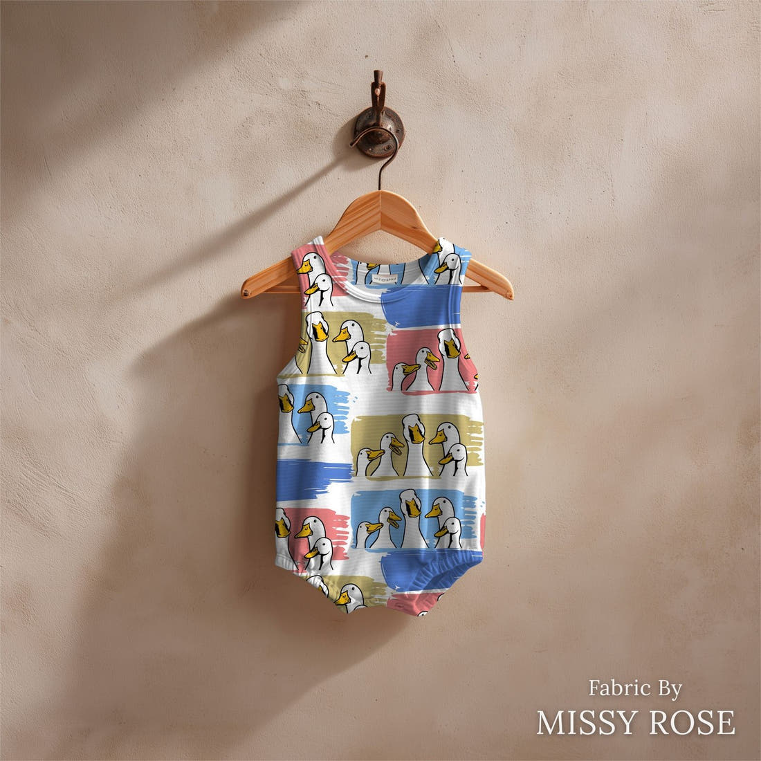 Design 209 Ducks Fabric sewn into a baby romper – see how the print looks made up | Fabric by Missy Rose