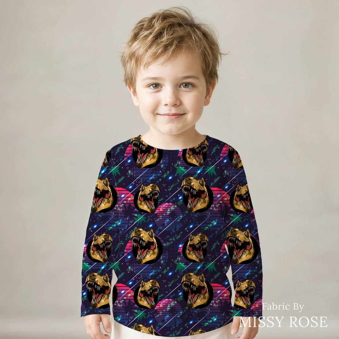 Design 224 Navy Dinosaur Fabric sewn into a kids' long sleeve top – see how the print looks made up | Fabric by Missy Rose