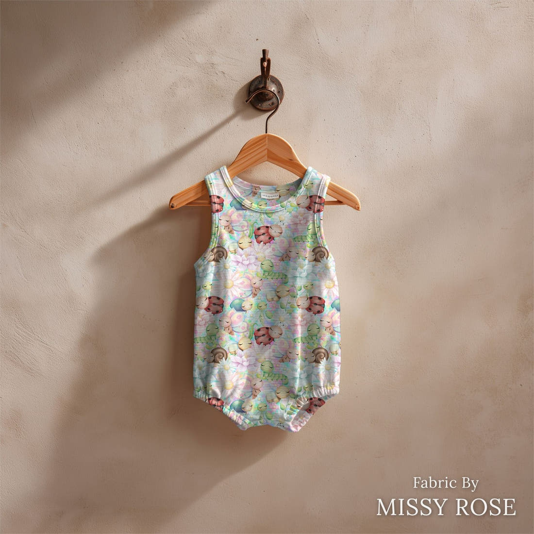 Design 225 Cute Bugs Fabric sewn into a baby romper – see how the print looks made up | Fabric by Missy Rose