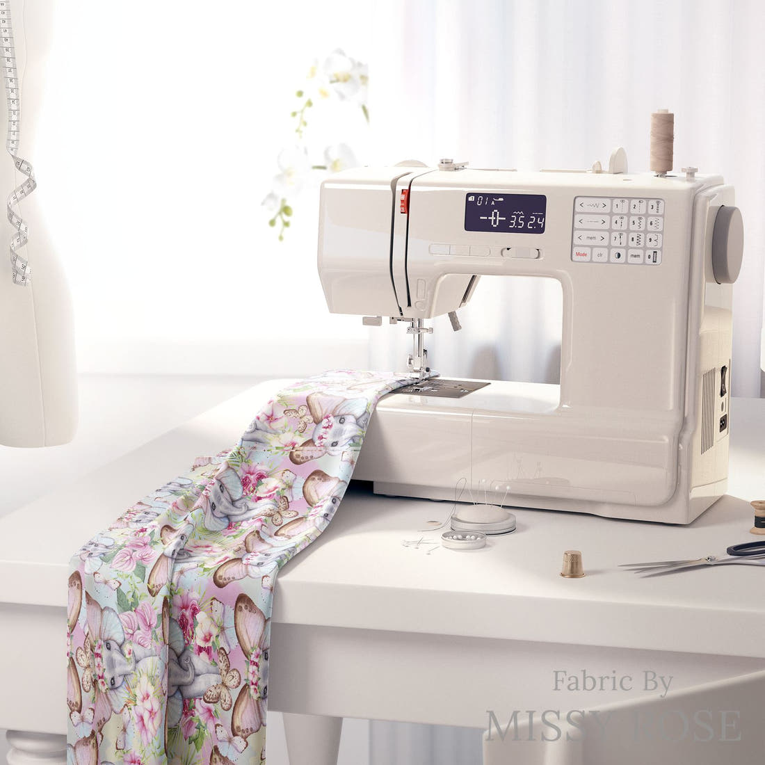 Design 241 Floral Elephant Fabric on a sewing machine – premium fabric for sewing projects | Fabric by Missy Rose