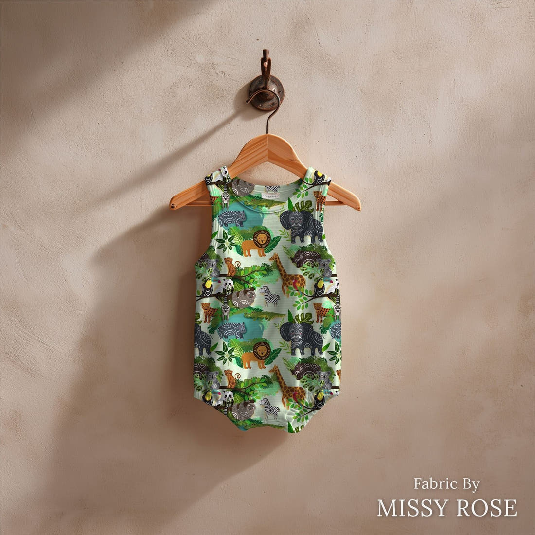 Design 248 Green Jungle Fabric sewn into a baby romper – see how the print looks made up | Fabric by Missy Rose