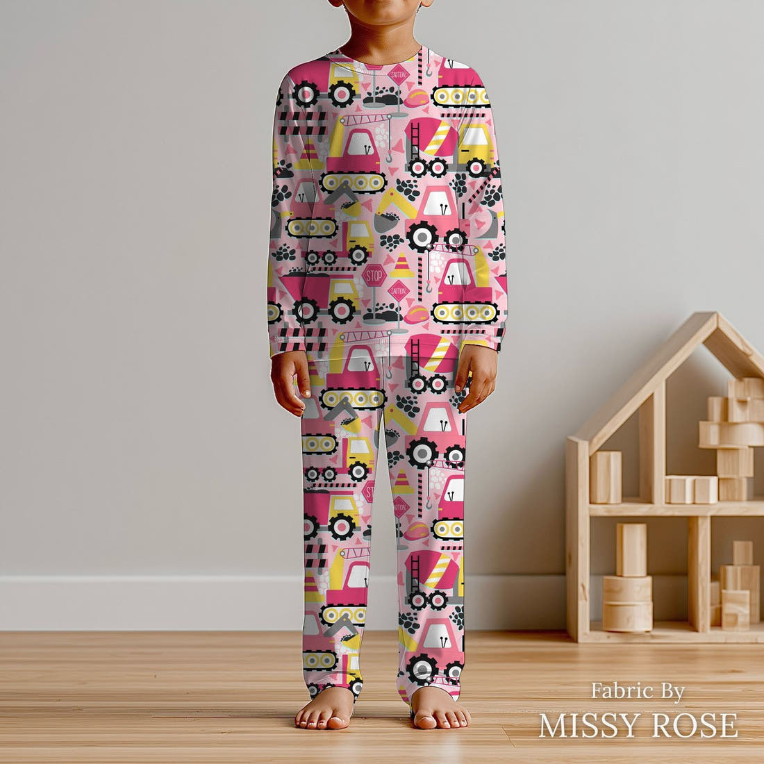 Design 256 Pink Construction Fabric sewn into kids' pyjamas – see how the print looks made up | Fabric by Missy Rose