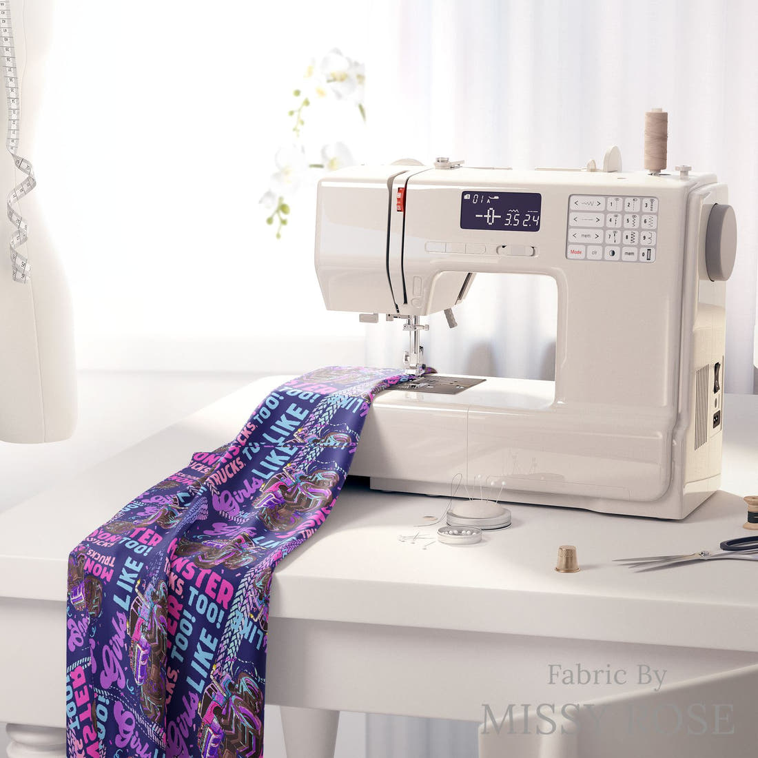 Design 258 Monster Truck Fabric on a sewing machine – premium fabric for sewing projects | Fabric by Missy Rose