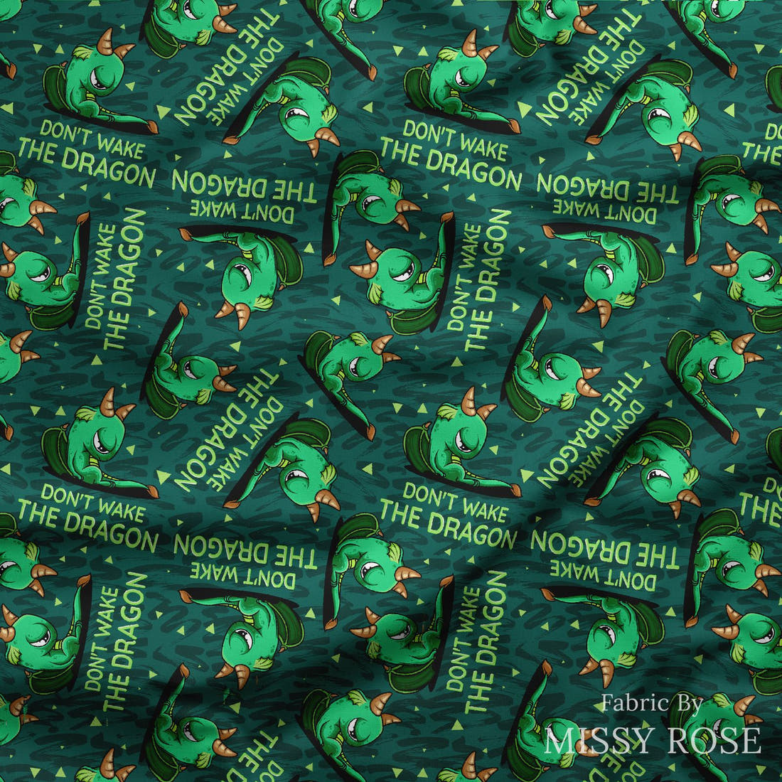 Design 263 Grumpy Dragon Fabric draped fabric mockup – custom printed fabric by the metre | Fabric by Missy Rose