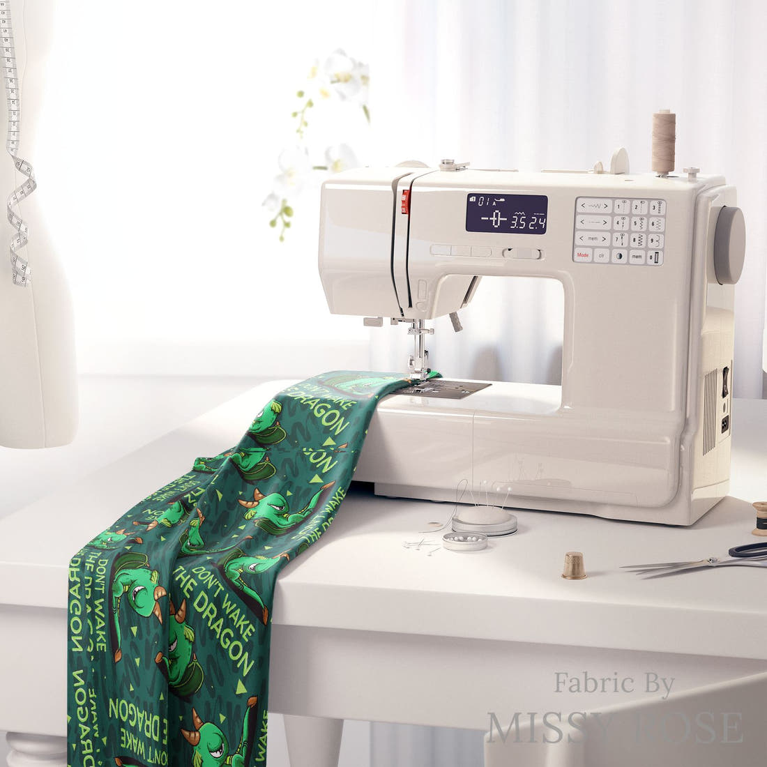 Design 263 Grumpy Dragon Fabric on a sewing machine – premium fabric for sewing projects | Fabric by Missy Rose