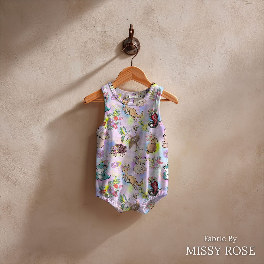 Design 273 Cute Australian Animals Fabric sewn into a baby romper – see how the print looks made up | Fabric by Missy Rose