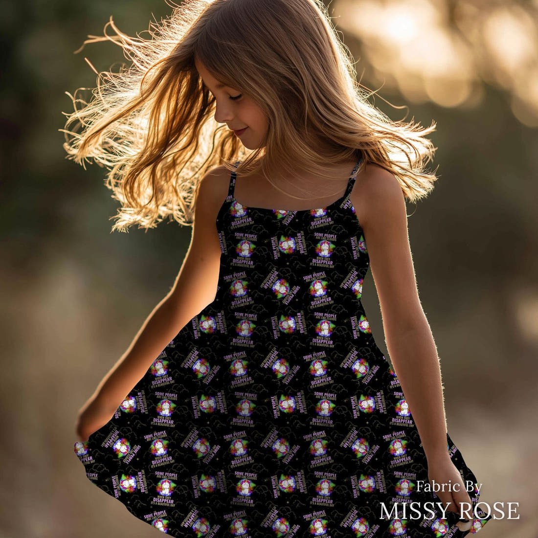 Design 282 Funny Unicorn Fabric sewn into a girls' dress – see how the print looks made up | Fabric by Missy Rose