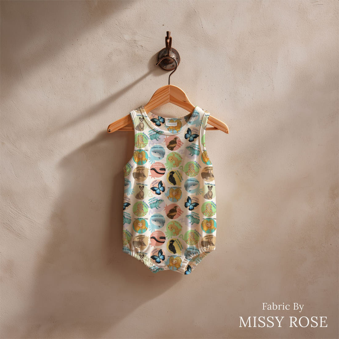 Design 29 White Australian Animals Fabric sewn into a baby romper – see how the print looks made up | Fabric by Missy Rose
