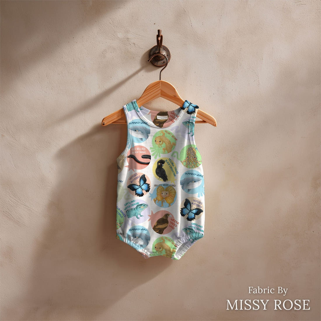 Design 29 White Australian Animals Fabric sewn into a baby romper – see how the print looks made up | Fabric by Missy Rose