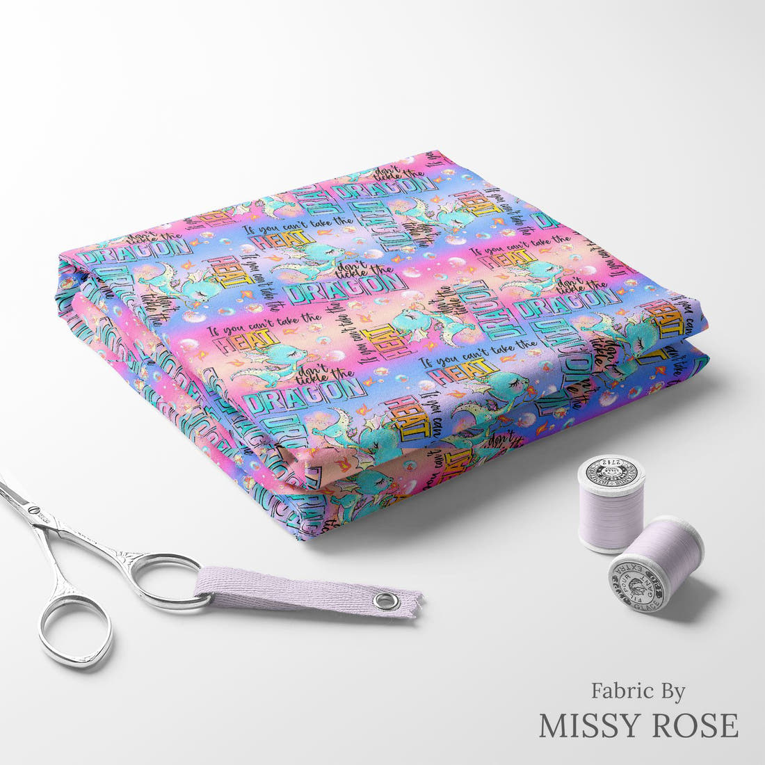 Design 293 Cheeky Dragon Fabric folded fabric stack with matching thread – pre-order fabric Australia | Fabric by Missy Rose