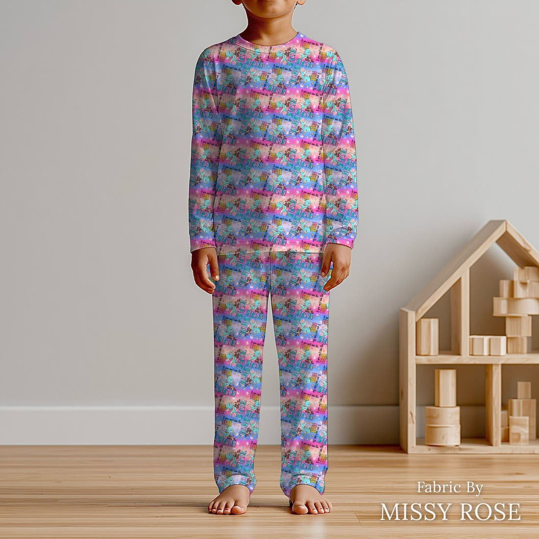 Design 293 Cheeky Dragon Fabric sewn into kids' pyjamas – see how the print looks made up | Fabric by Missy Rose
