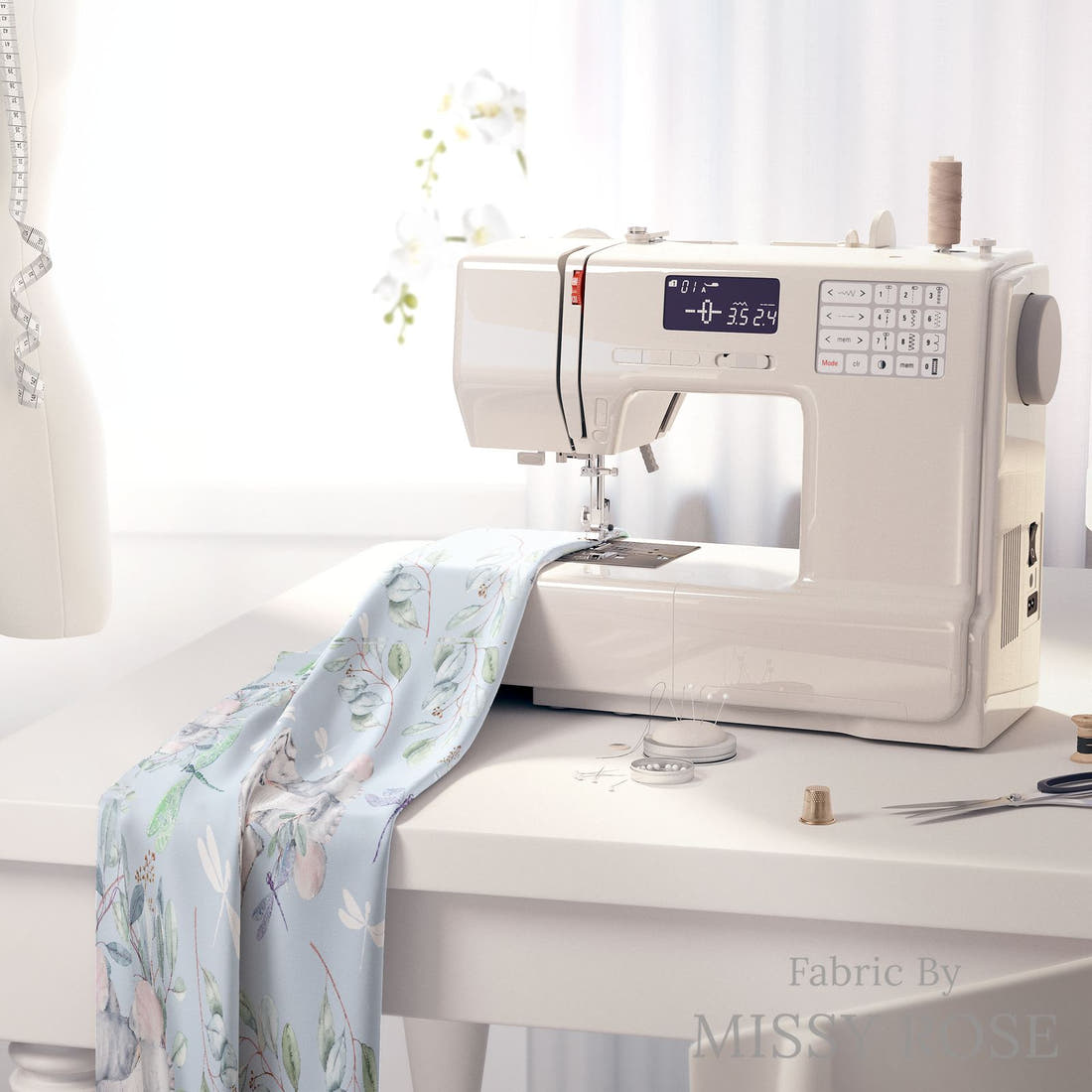 Design 30 Baby Elephant Fabric on a sewing machine – premium fabric for sewing projects | Fabric by Missy Rose
