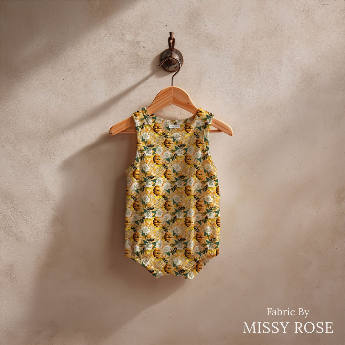 Design 31 Bee Hive Fabric sewn into a baby romper – see how the print looks made up | Fabric by Missy Rose