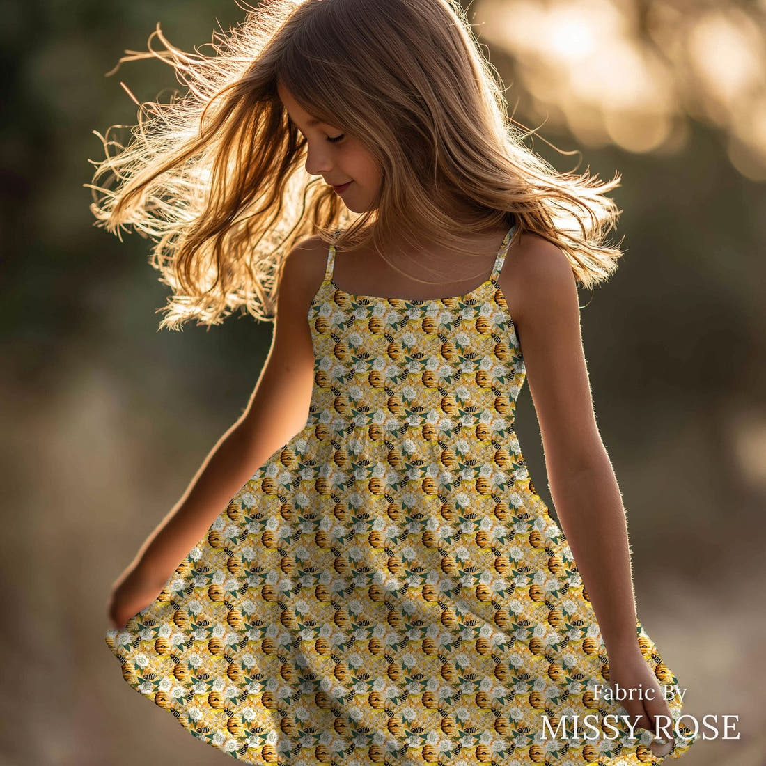 Design 31 Bee Hive Fabric sewn into a girls' dress – see how the print looks made up | Fabric by Missy Rose