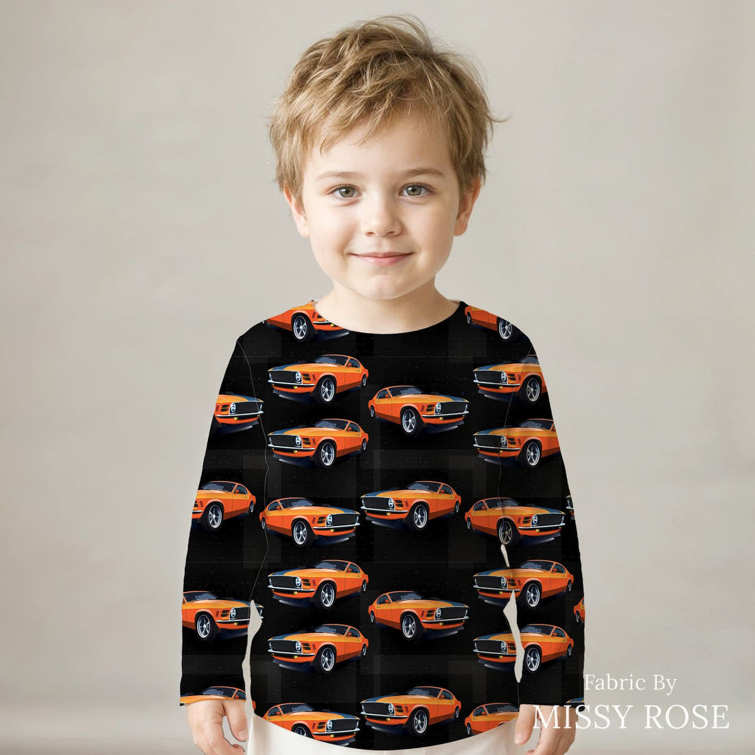 Design 32 Orange Car Fabric sewn into a kids' long sleeve top – see how the print looks made up | Fabric by Missy Rose