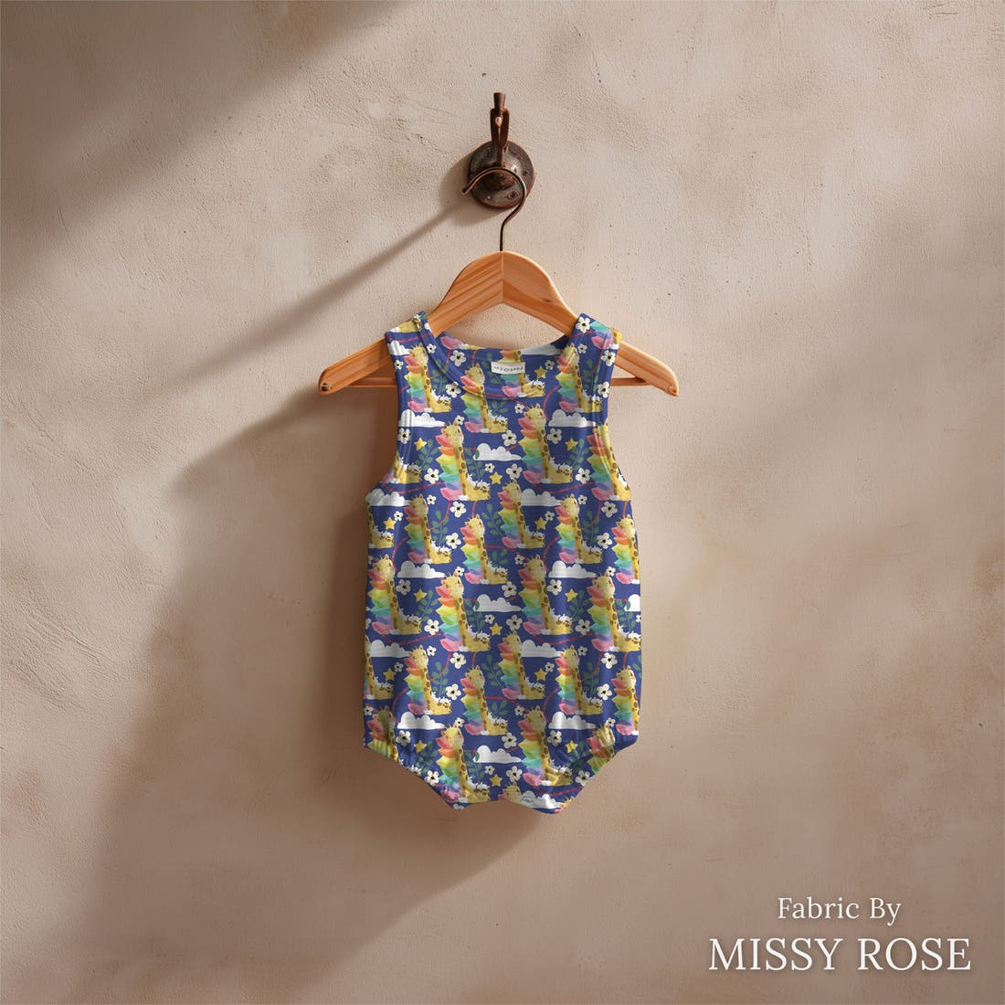 Design 337 Sleepy Giraffe Fabric sewn into a baby romper – see how the print looks made up | Fabric by Missy Rose