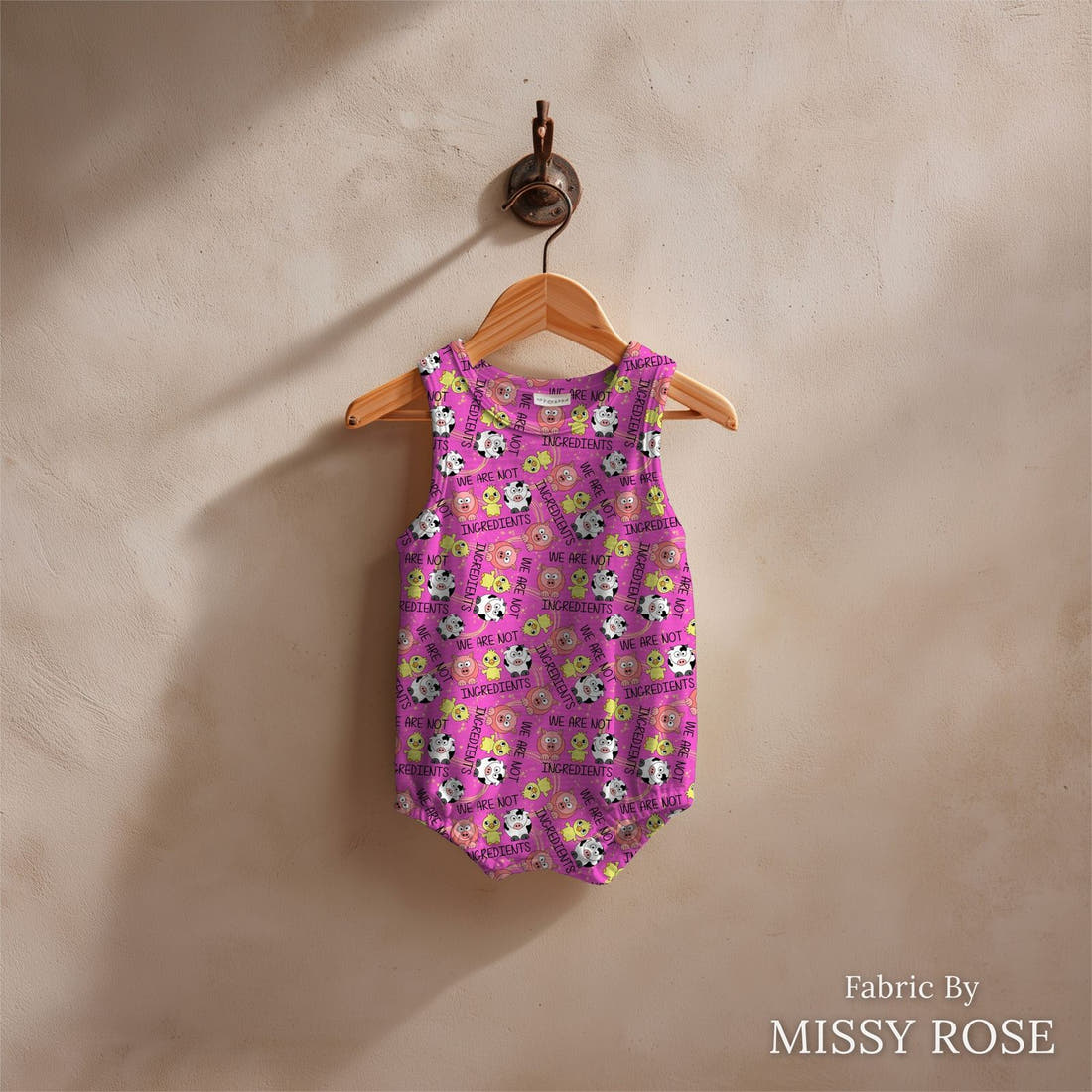 Design 345 Farm Friends Fabric sewn into a baby romper – see how the print looks made up | Fabric by Missy Rose