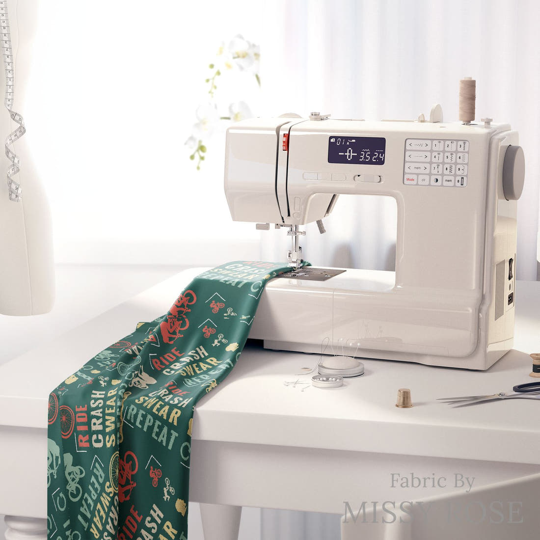 Design 354 Mountain Bike Fabric on a sewing machine – premium fabric for sewing projects | Fabric by Missy Rose