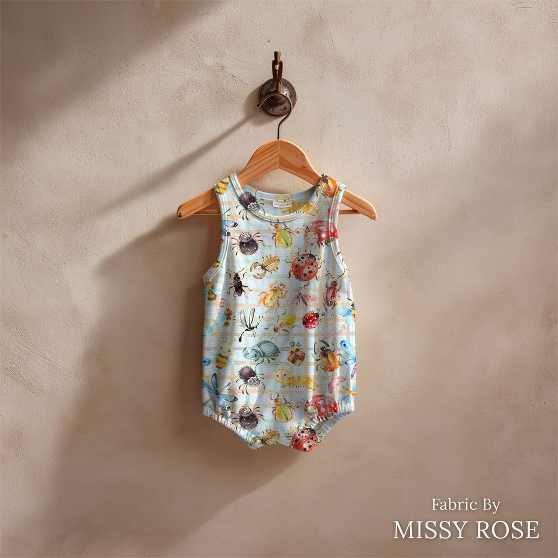 Design 362 Cute Plaid Insects Fabric sewn into a baby romper – see how the print looks made up | Fabric by Missy Rose