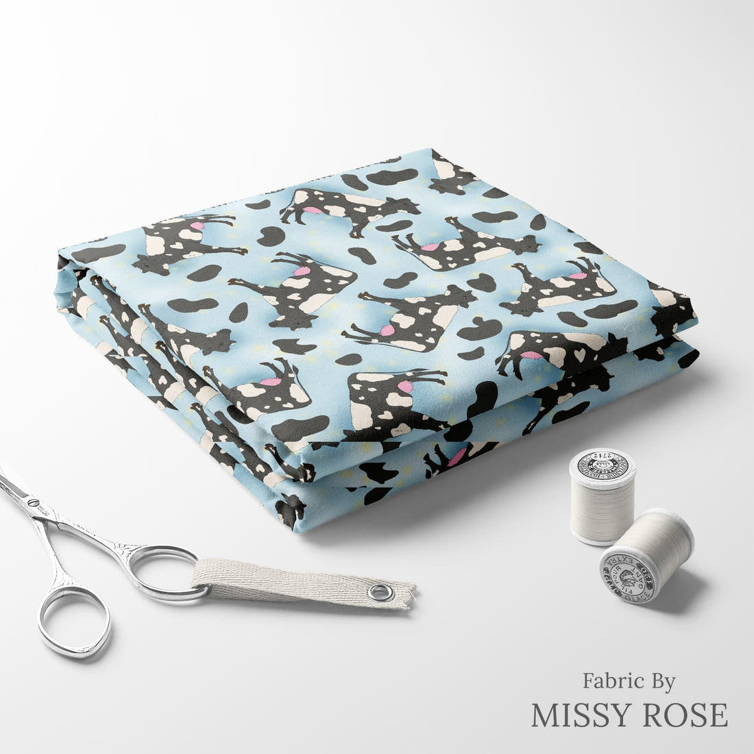 Design 371 Blue Cow Fabric folded fabric stack with matching thread – pre-order fabric Australia | Fabric by Missy Rose