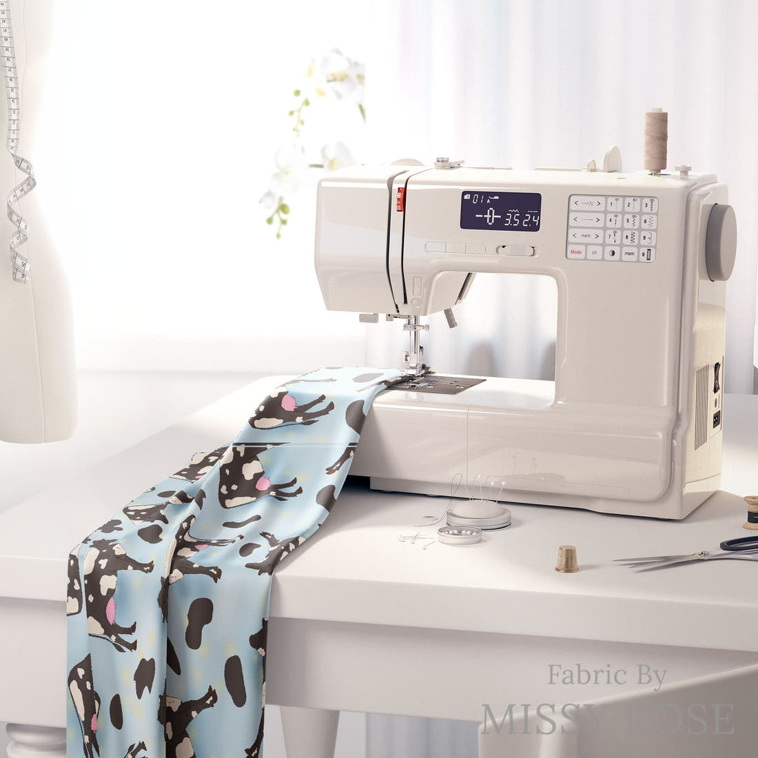 Design 371 Blue Cow Fabric on a sewing machine – premium fabric for sewing projects | Fabric by Missy Rose