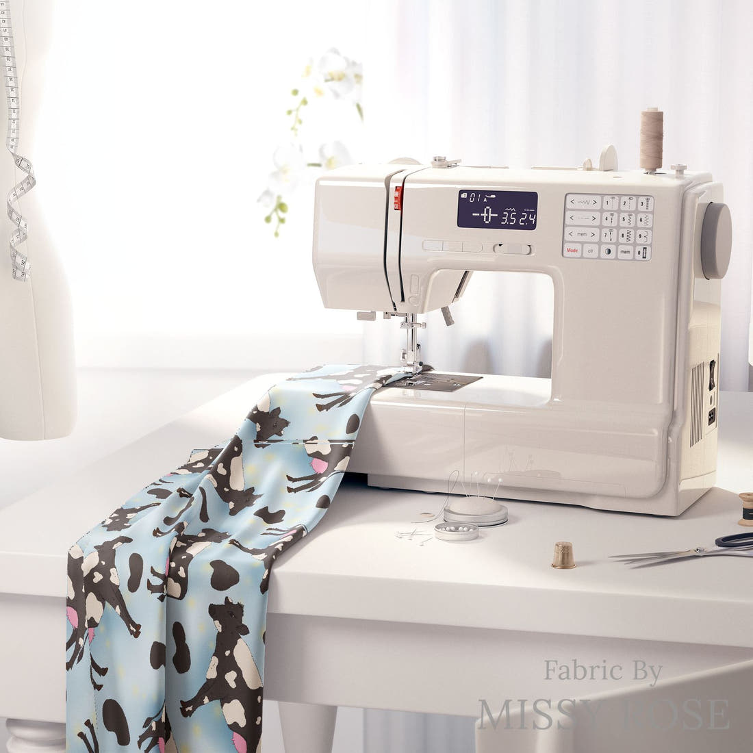 Design 371 Blue Cow Fabric on a sewing machine – premium fabric for sewing projects | Fabric by Missy Rose