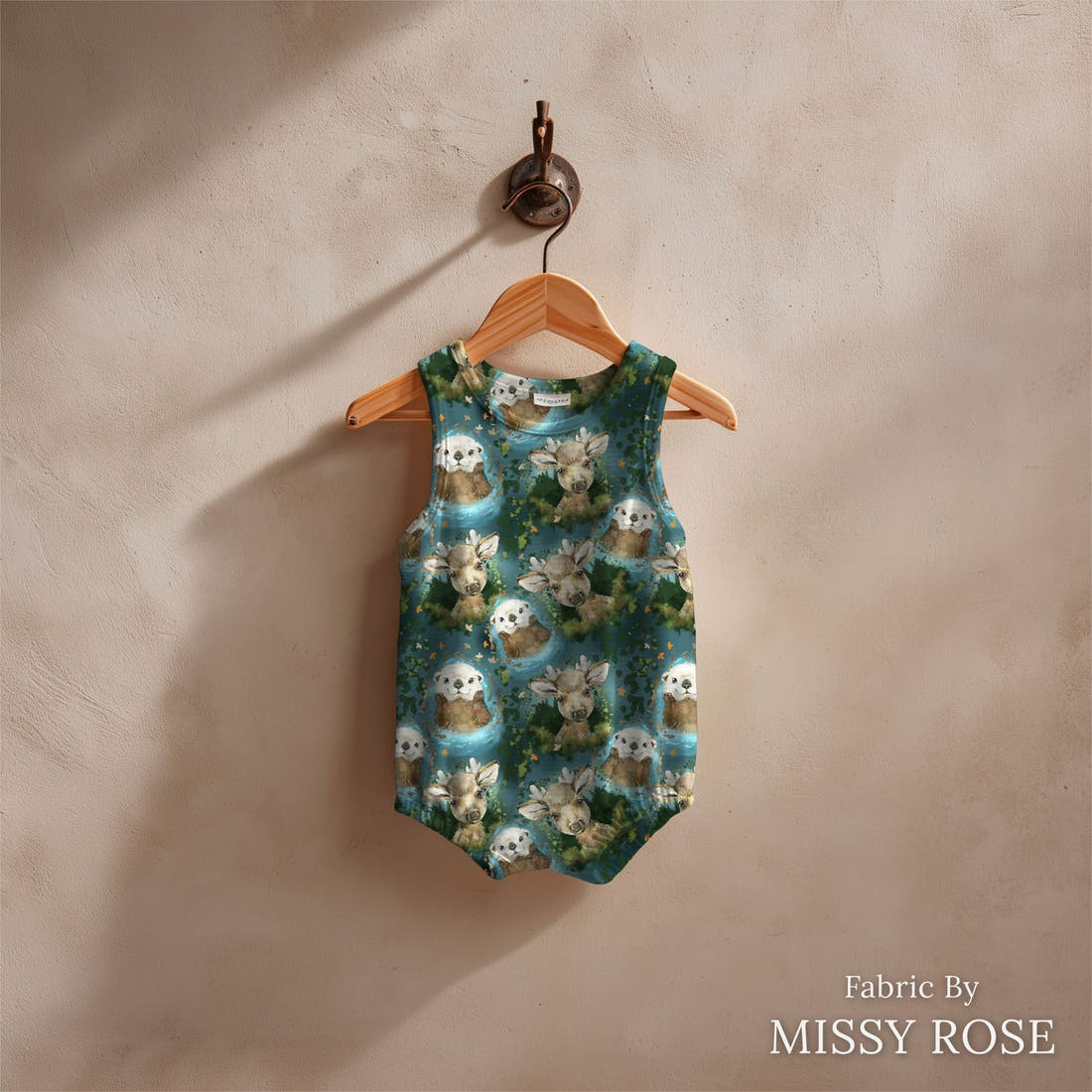 Design 385 Otter Fabric sewn into a baby romper – see how the print looks made up | Fabric by Missy Rose