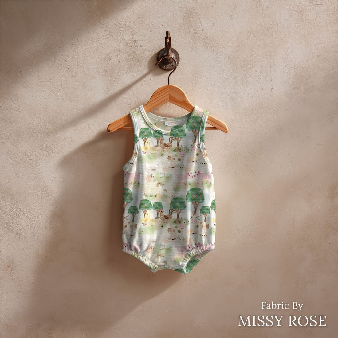 Design 387 Farm Yard Fabric sewn into a baby romper – see how the print looks made up | Fabric by Missy Rose
