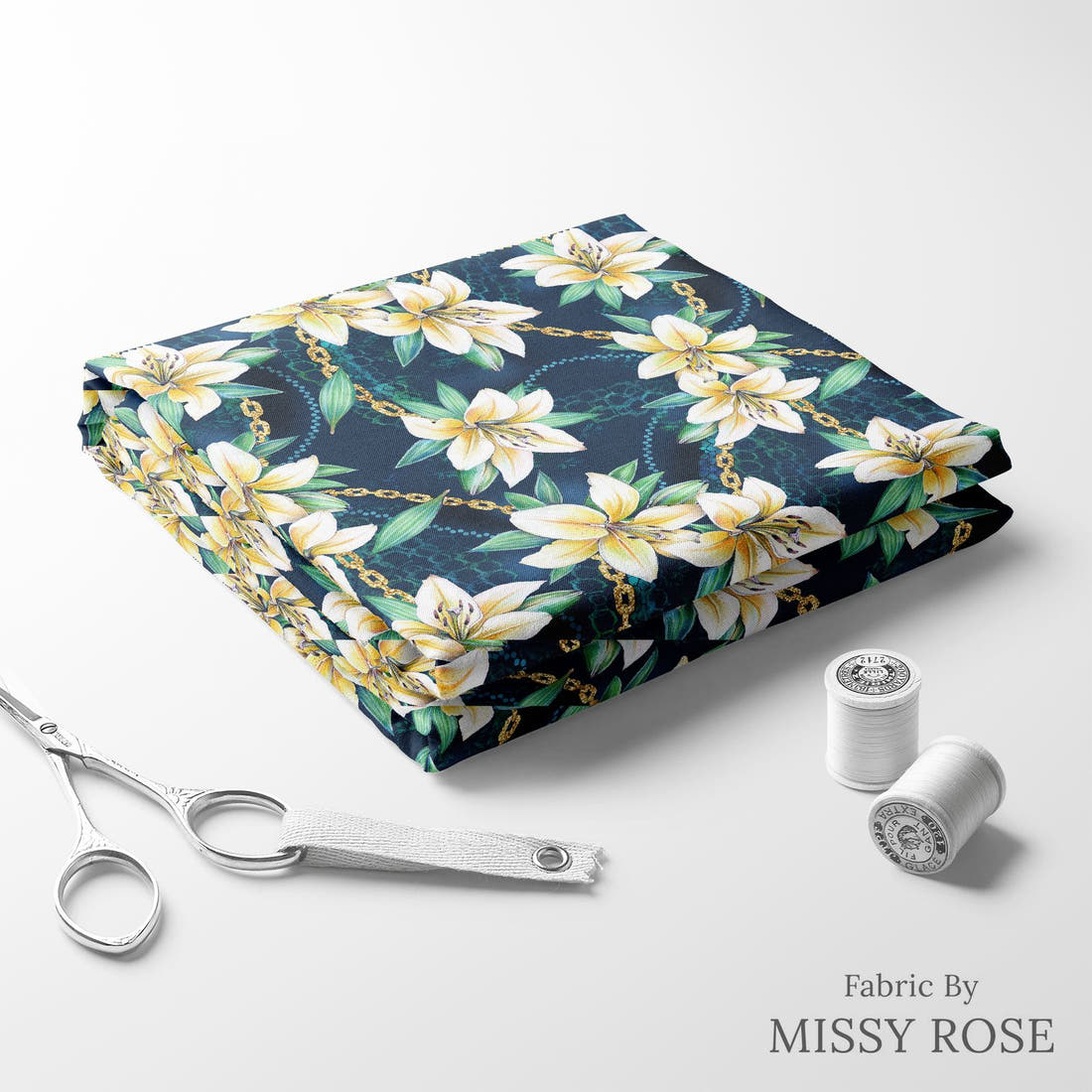 Design 400 Navy Lily Fabric folded fabric stack with matching thread – pre-order fabric Australia | Fabric by Missy Rose