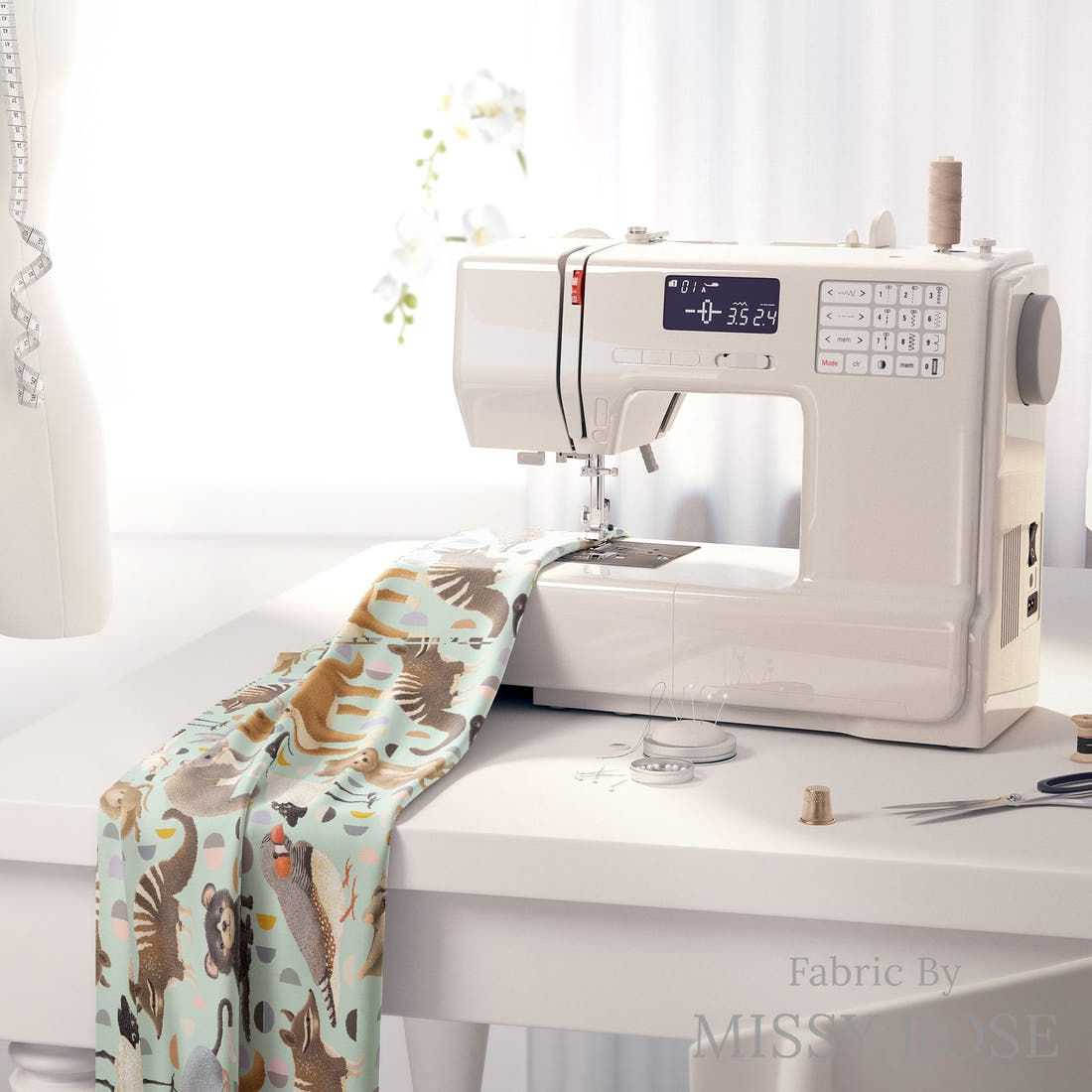 Design 401 Light Blue Australian Animals Fabric on a sewing machine – premium fabric for sewing projects | Fabric by Missy Rose
