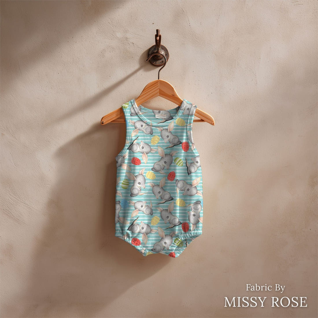Design 411 Blue Bilby Fabric sewn into a baby romper – see how the print looks made up | Fabric by Missy Rose