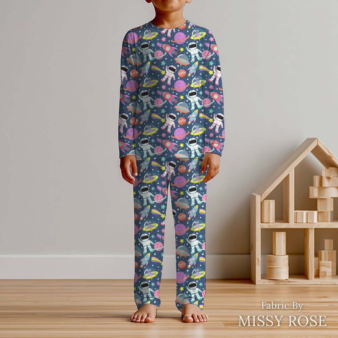 Design 414 Astronaut Fabric sewn into kids' pyjamas – see how the print looks made up | Fabric by Missy Rose