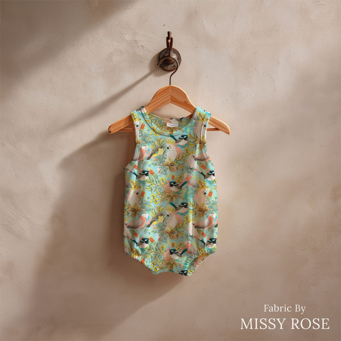Design 42 Australian Birds Fabric sewn into a baby romper – see how the print looks made up | Fabric by Missy Rose