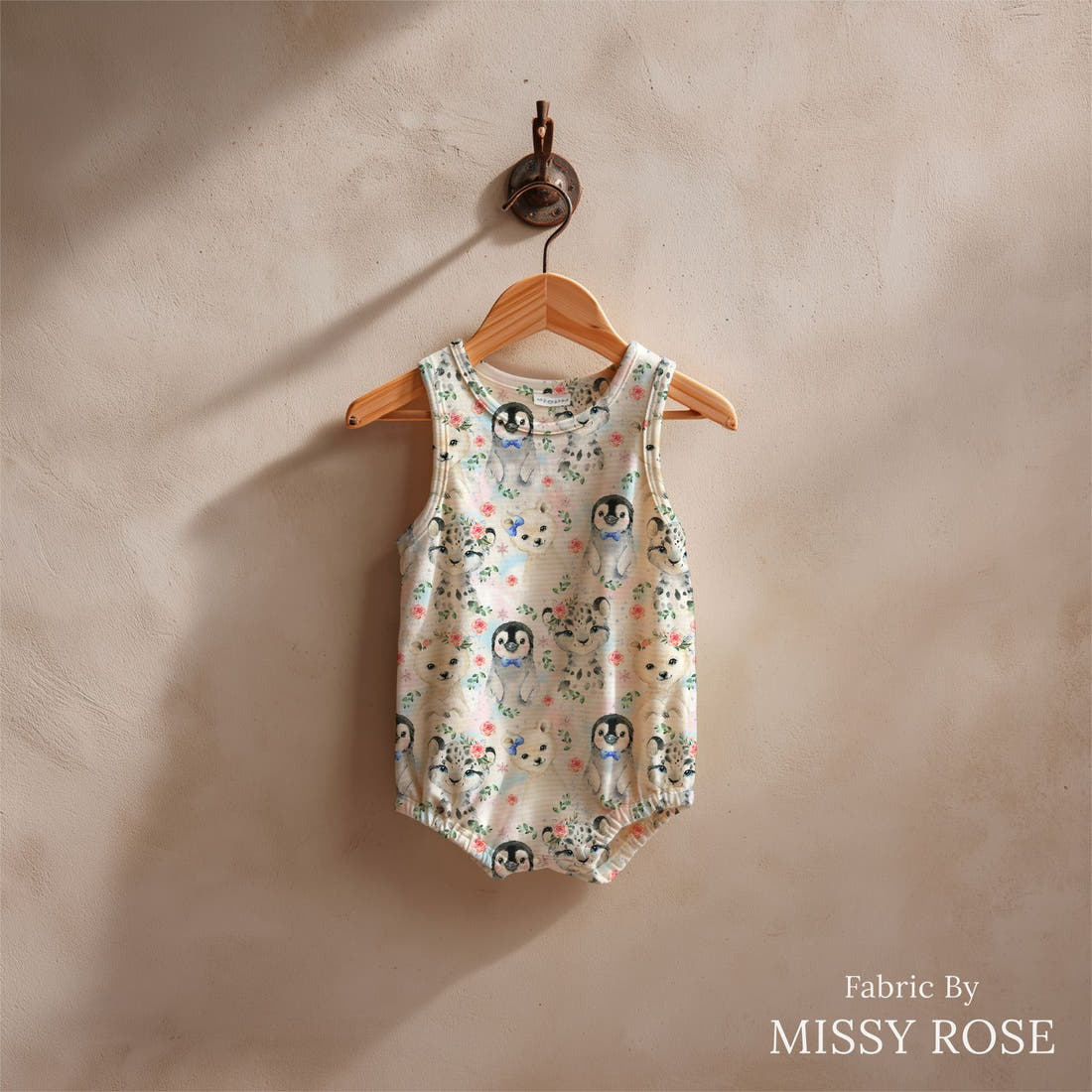 Design 421 Snow Animals Fabric sewn into a baby romper – see how the print looks made up | Fabric by Missy Rose
