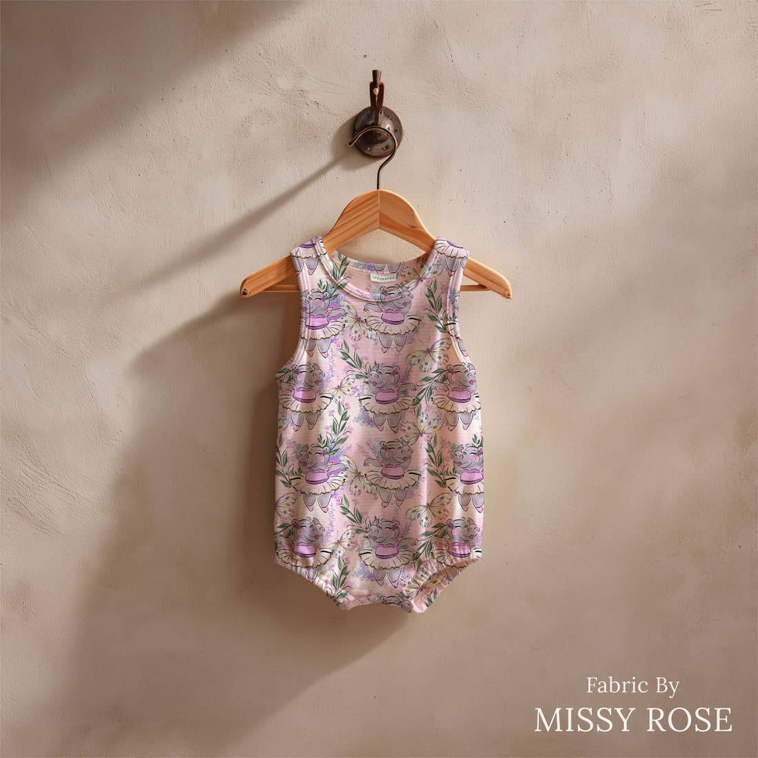 Design 422 Hippo Fabric sewn into a baby romper – see how the print looks made up | Fabric by Missy Rose