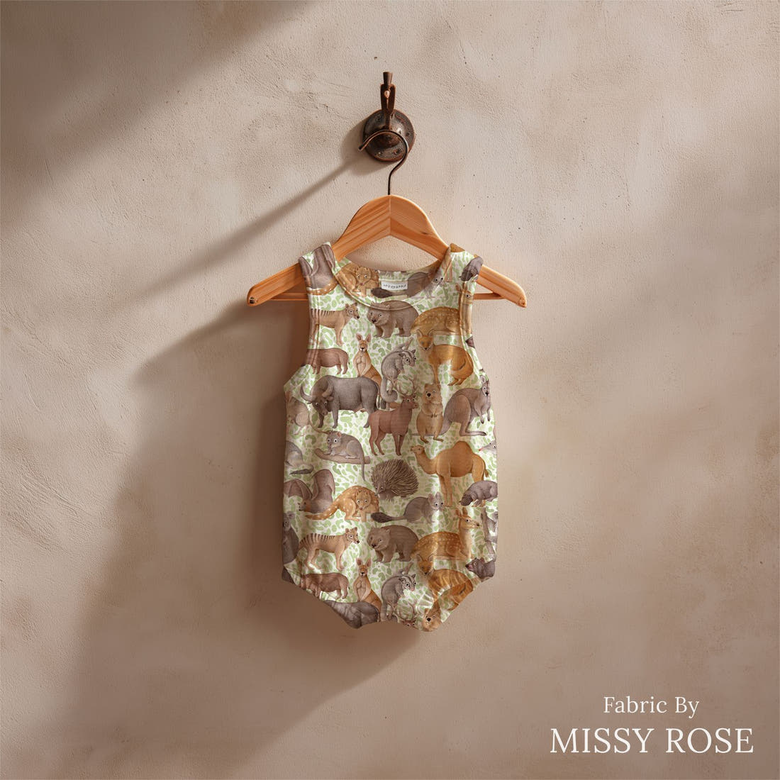 Design 424 Australian Animals Fabric sewn into a baby romper – see how the print looks made up | Fabric by Missy Rose