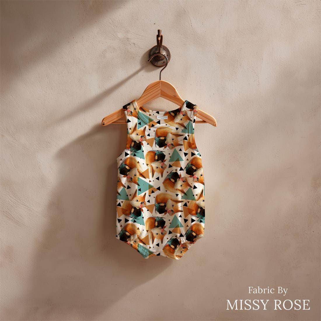 Design 447 Sweet Fox Fabric sewn into a baby romper – see how the print looks made up | Fabric by Missy Rose