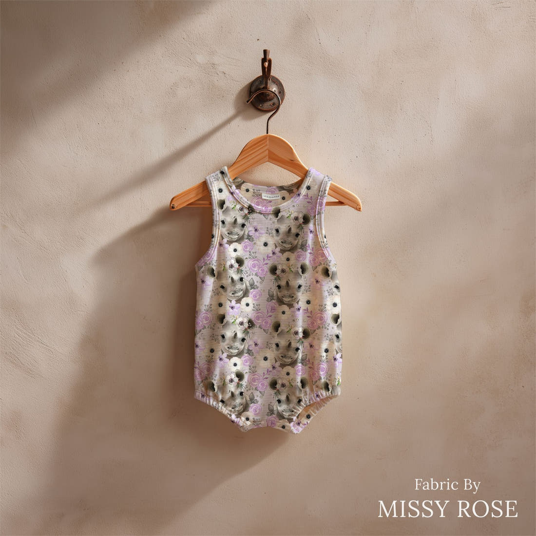 Design 450 Purple Rhino Fabric sewn into a baby romper – see how the print looks made up | Fabric by Missy Rose