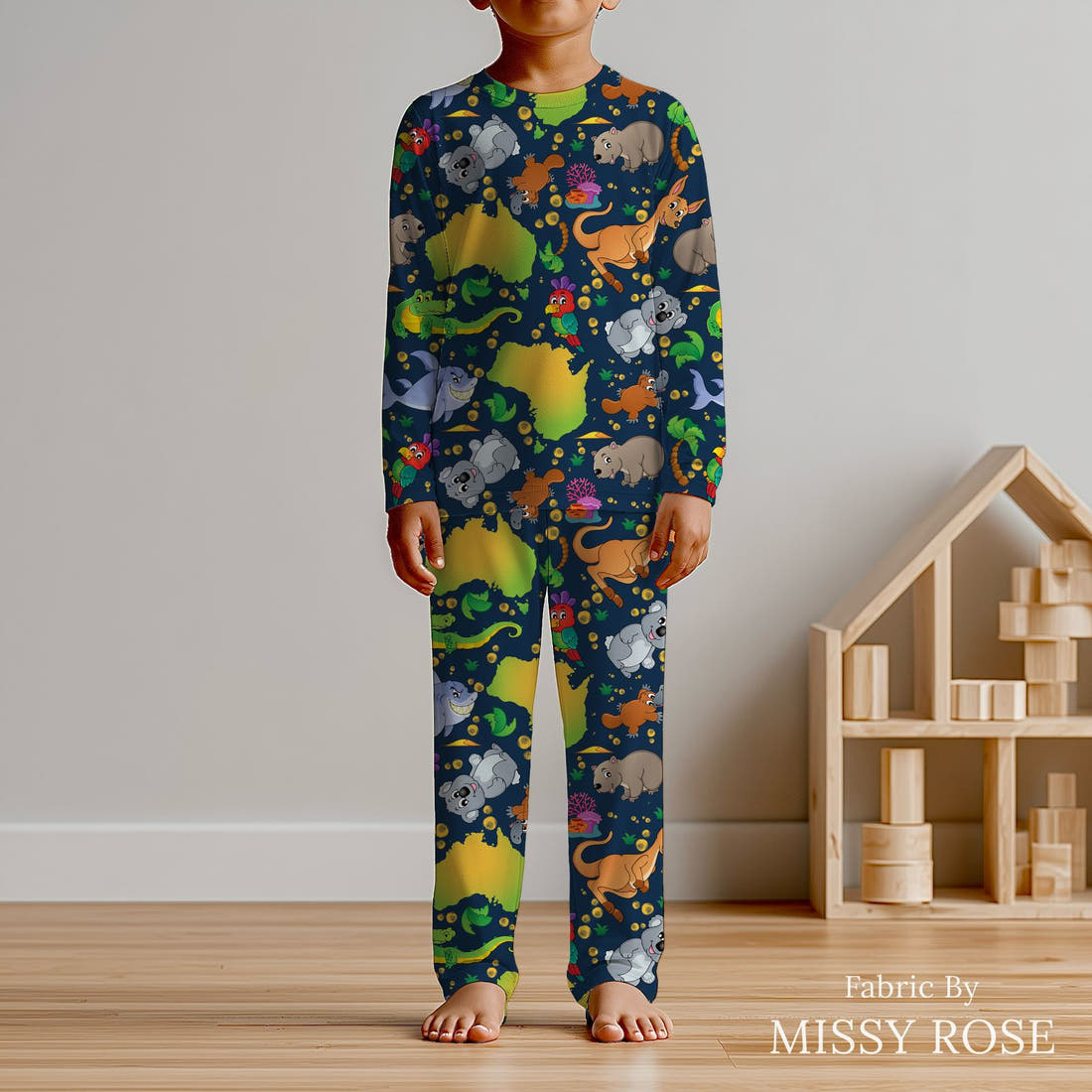 Design 457 Navy Map Fabric sewn into kids' pyjamas – see how the print looks made up | Fabric by Missy Rose