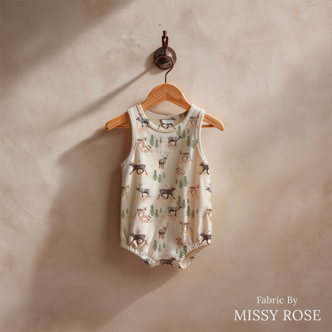 Design 46 Wilderness Fabric sewn into a baby romper – see how the print looks made up | Fabric by Missy Rose