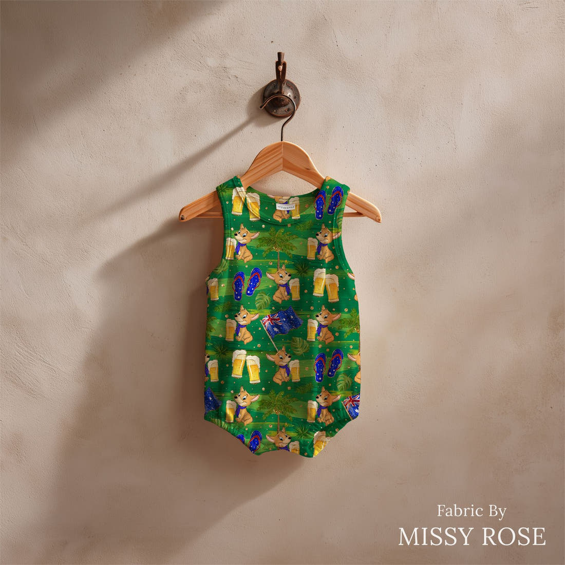 Design 475 Dingo Fabric sewn into a baby romper – see how the print looks made up | Fabric by Missy Rose