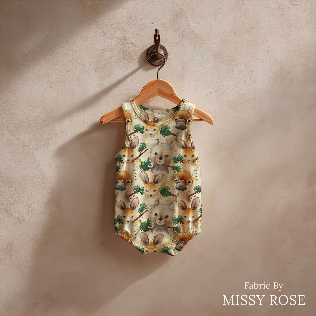 Design 486 Neutral Australian Animals Fabric sewn into a baby romper – see how the print looks made up | Fabric by Missy Rose