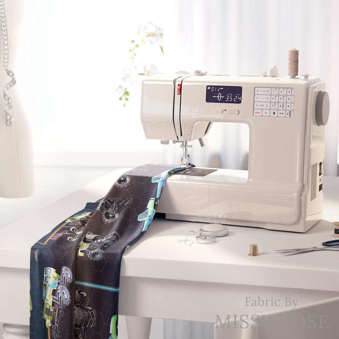 Design 490 Navy Monster Truck Fabric on a sewing machine – premium fabric for sewing projects | Fabric by Missy Rose