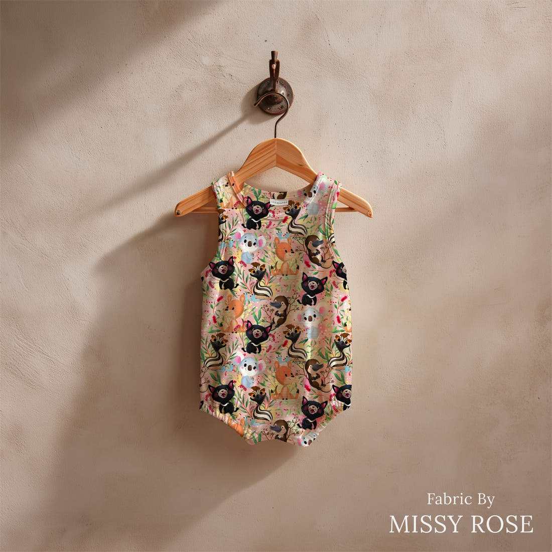 Design 496 Pink Australian Animal Fabric sewn into a baby romper – see how the print looks made up | Fabric by Missy Rose