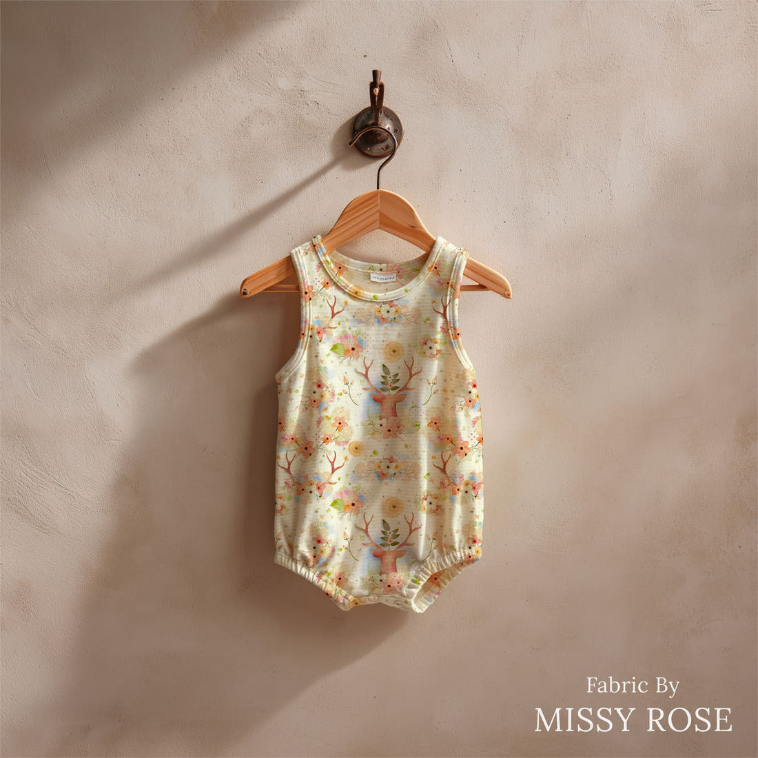 Design 502 Neutral Woodlands Fabric sewn into a baby romper – see how the print looks made up | Fabric by Missy Rose