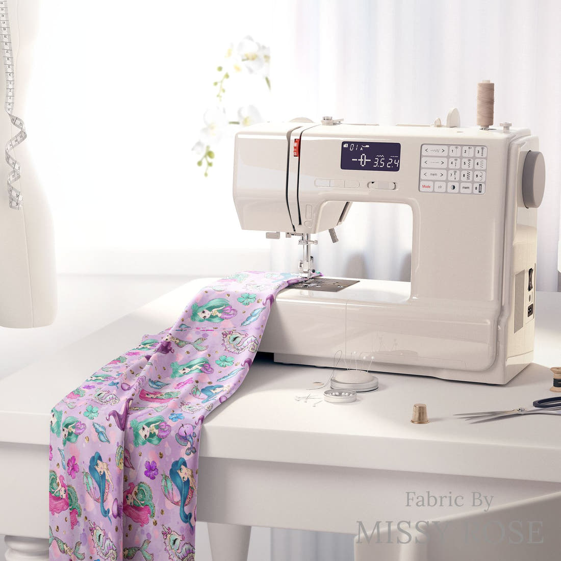 Design 503 Purple Mermaid Fabric on a sewing machine – premium fabric for sewing projects | Fabric by Missy Rose
